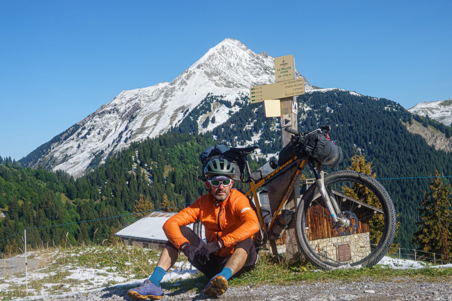 Bikepacking on the Alps Divide route, mixed alpine terrain.